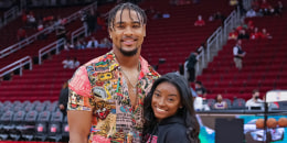 Simone Biles and Jonathan Owens  at a Houston Rockets game in 2021.